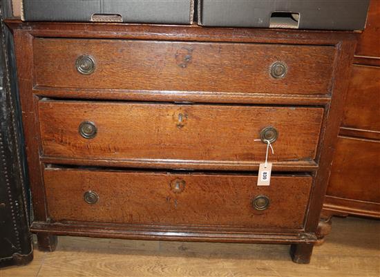 A small 18th century oak three drawer chest W.90cm